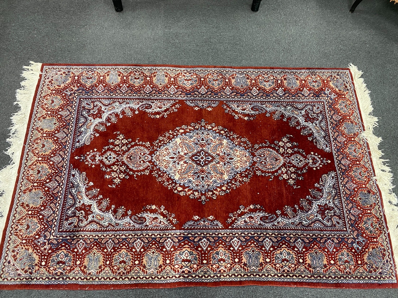 A North West Persian blue ground part silk rug, 220 x 217cm together with a similar smaller red ground rug